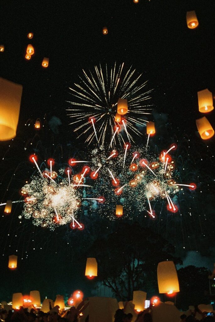 Spectacular view of lanterns and fireworks at a festival in Chiang Mai, Thailand.