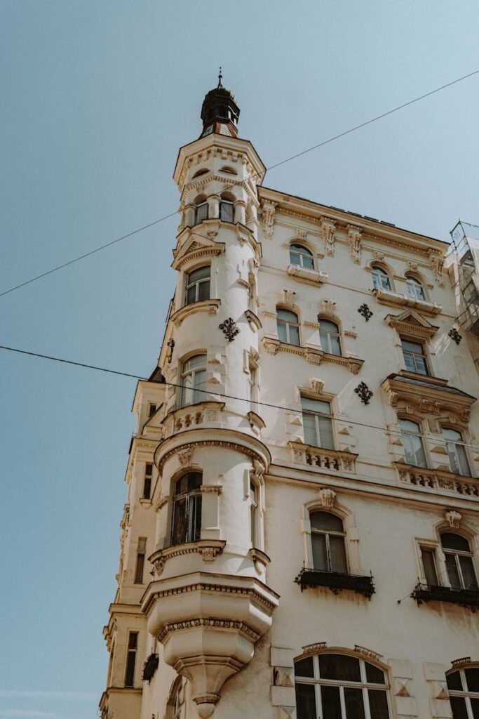 A tall building with a clock on the top of it